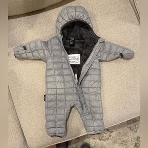 The North Face Light Gray One Piece Snowsuit with Quilted Design and Hood